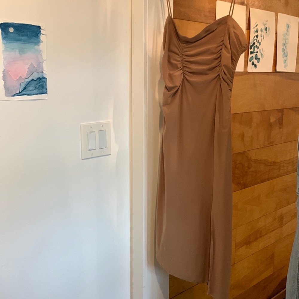 Tanned figure hugging midi dress